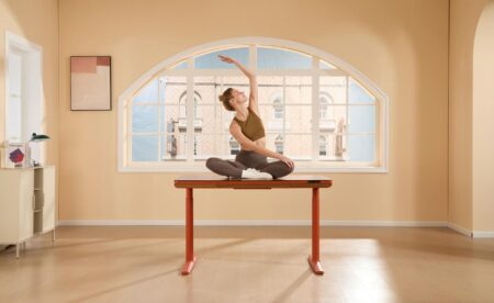 Modern office wellness room with exercise equipment and health monitoring stations