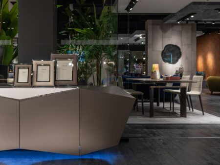 How Local Furniture Stores Generate Revenue Through Interior Design Consultations Modern furniture showroom with sofas and design displays showcasing interior consultation services