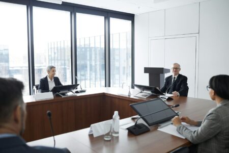 Professional business meeting with employees discussing internal opportunities and career development