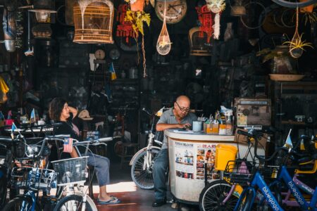 Interior of local bike shop showing bicycles displayed for sale and rental