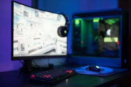 Modern gaming setup with multiple monitors and gaming peripherals