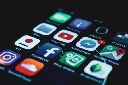 Person using mental health app on smartphone showing meditation and wellness features