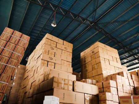 Large modern warehouse interior with high ceilings and storage systems
