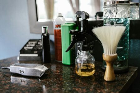Local Barbershops Boost Profits Through Premium Grooming Product Sales Modern barbershop interior with vintage chairs and product display shelves