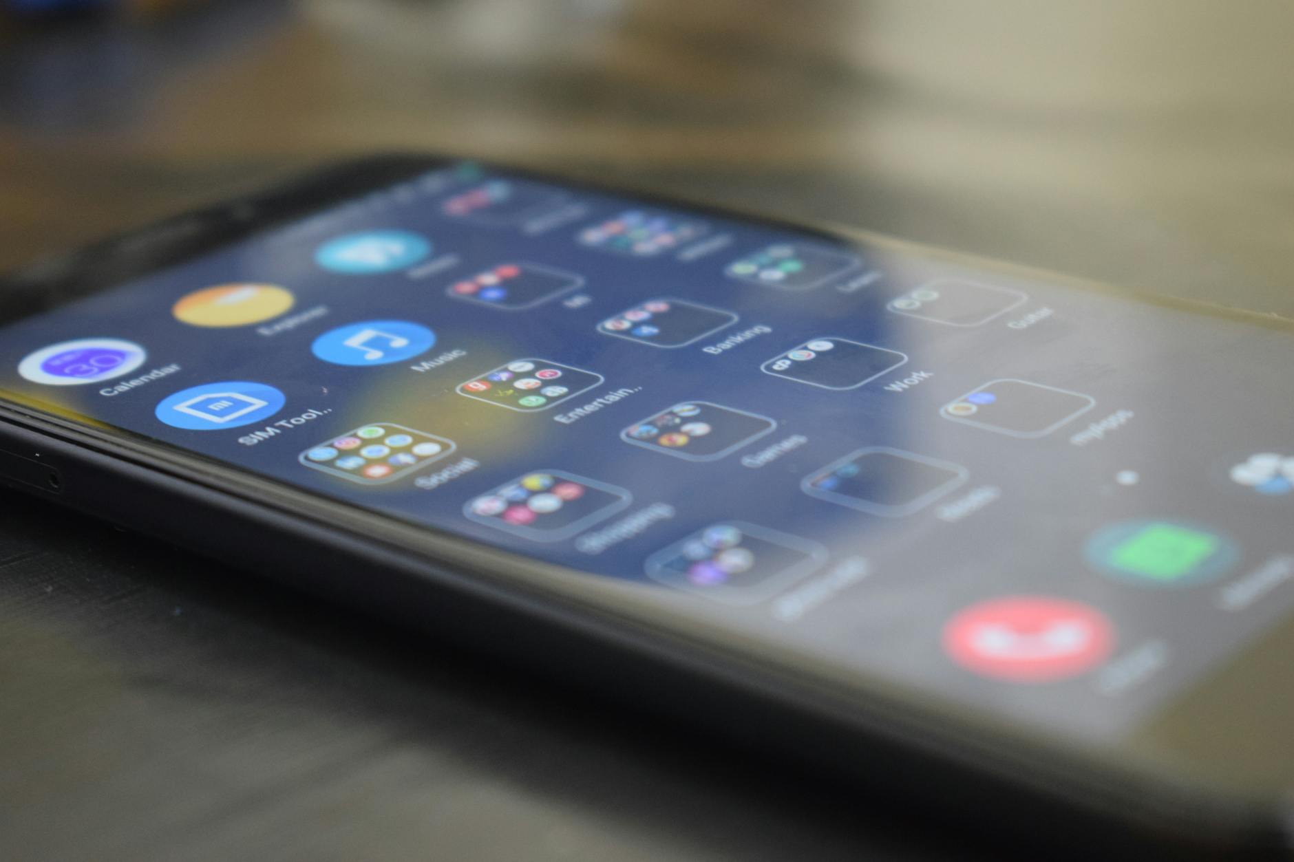 Person using mobile app to manage charitable donations and track giving history