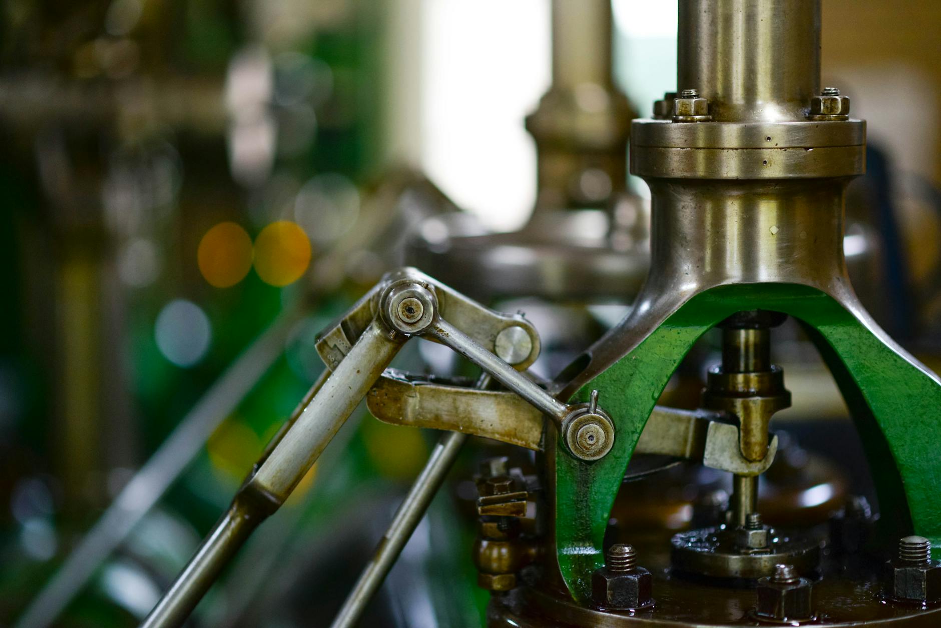 Industrial copper pipes and machinery showing base metals used in infrastructure and manufacturing