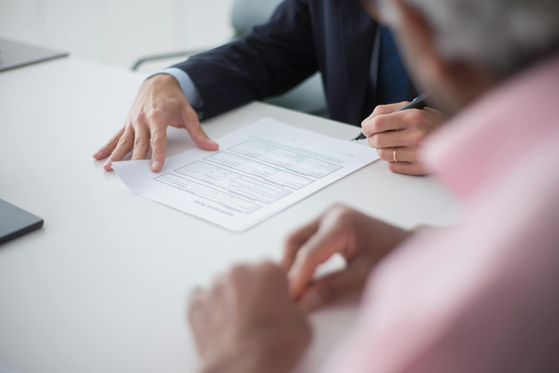 Professional consultation meeting between loan officer and client