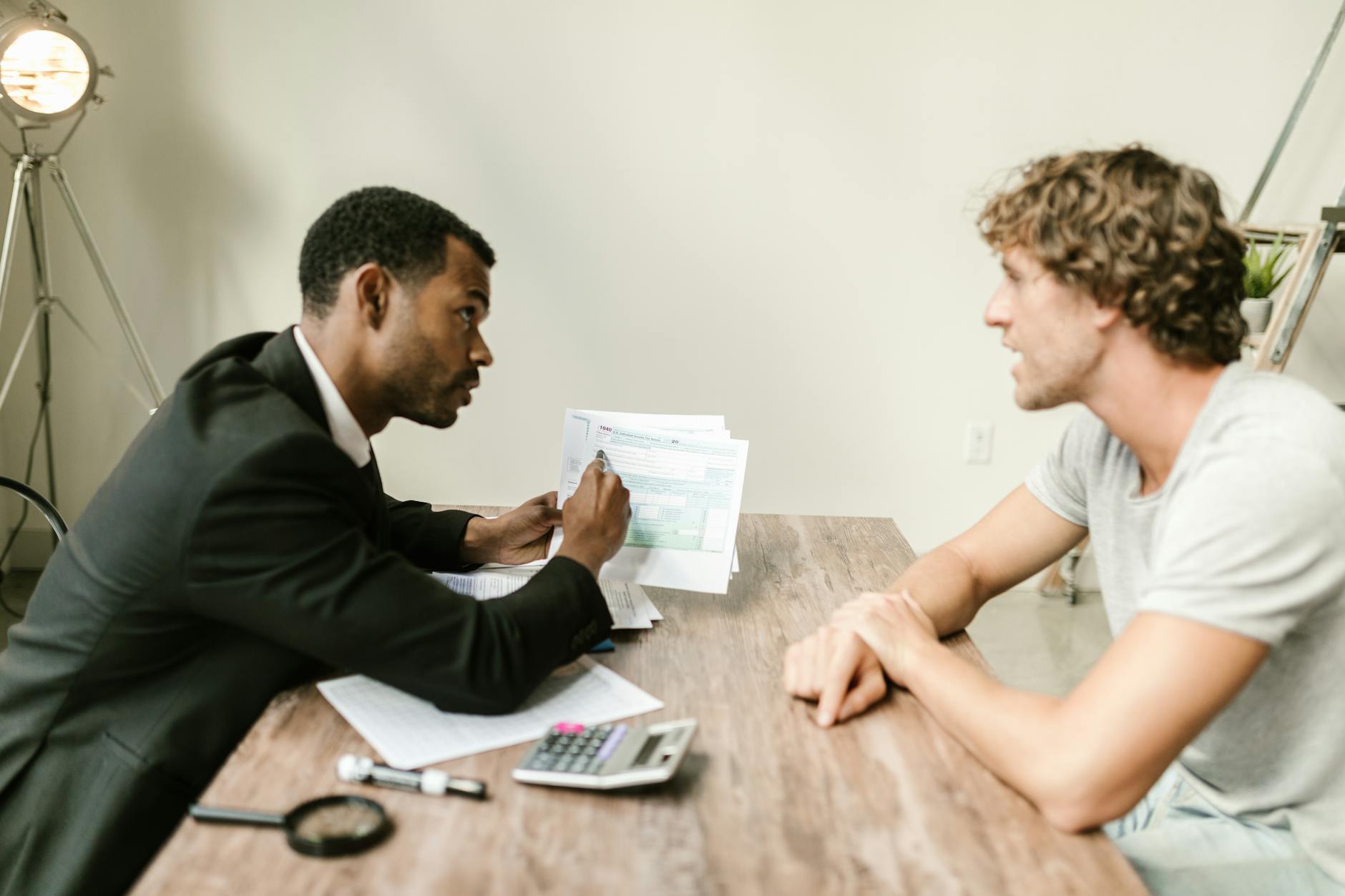 Financial advisor consulting with clients about investment portfolio diversification strategies