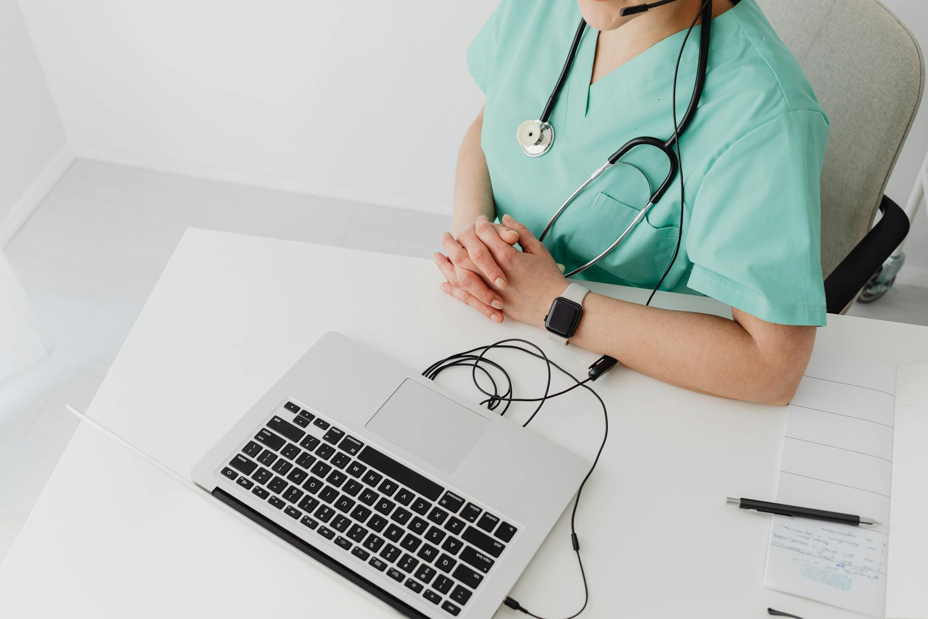 Medical consultation between healthcare provider and patient discussing treatment options