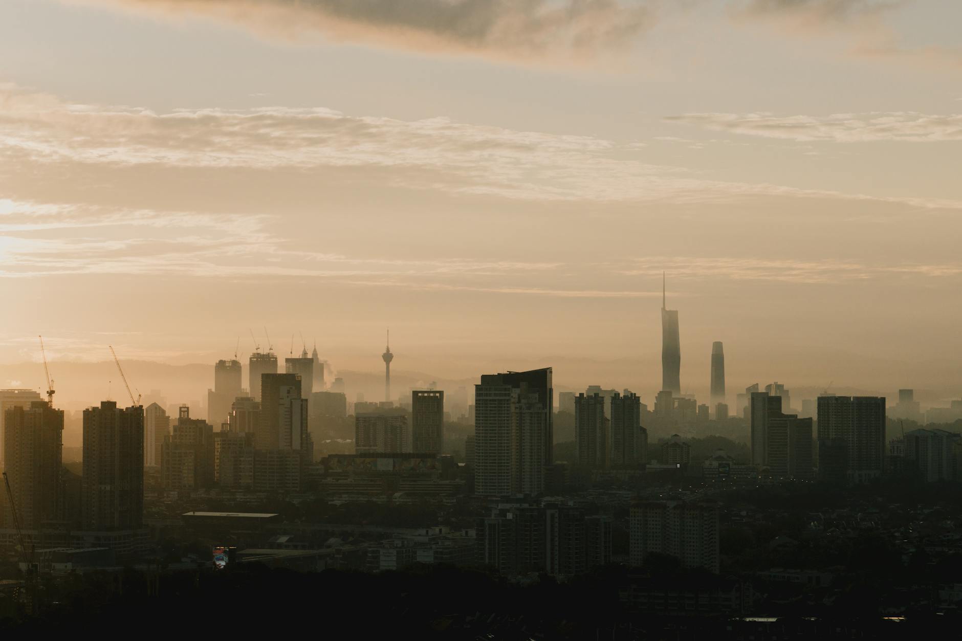 Modern city skyline with digital connectivity and infrastructure elements