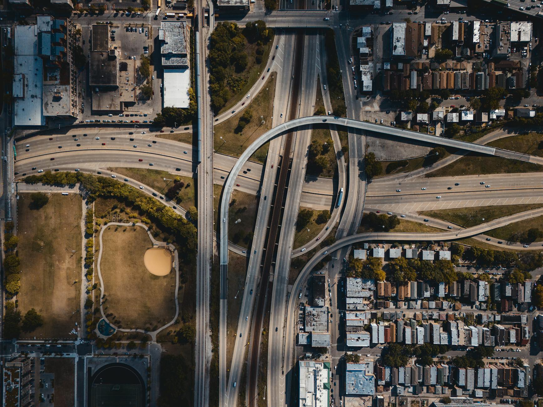 Multi-level highway interchange demonstrating transportation infrastructure complexity and investment needs