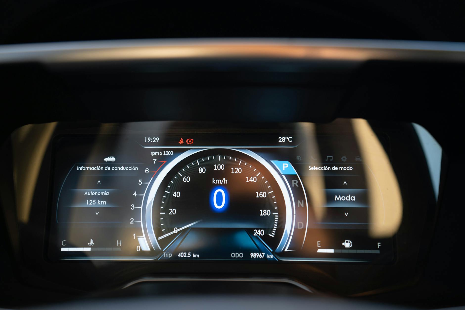 Digital compliance monitoring system displaying data analytics and reporting metrics on computer screens