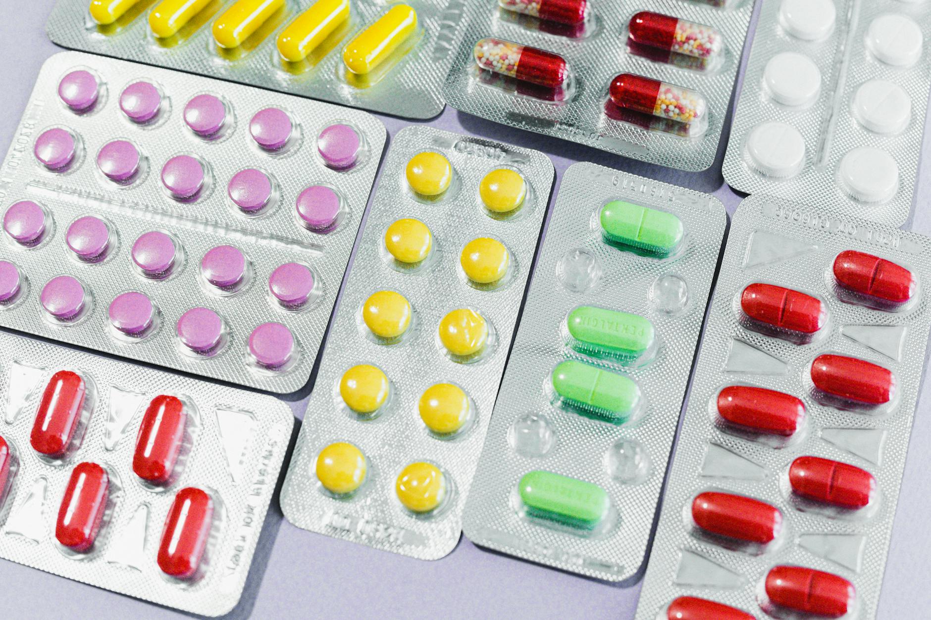 Prescription medication bottles and pills representing pharmaceutical industry