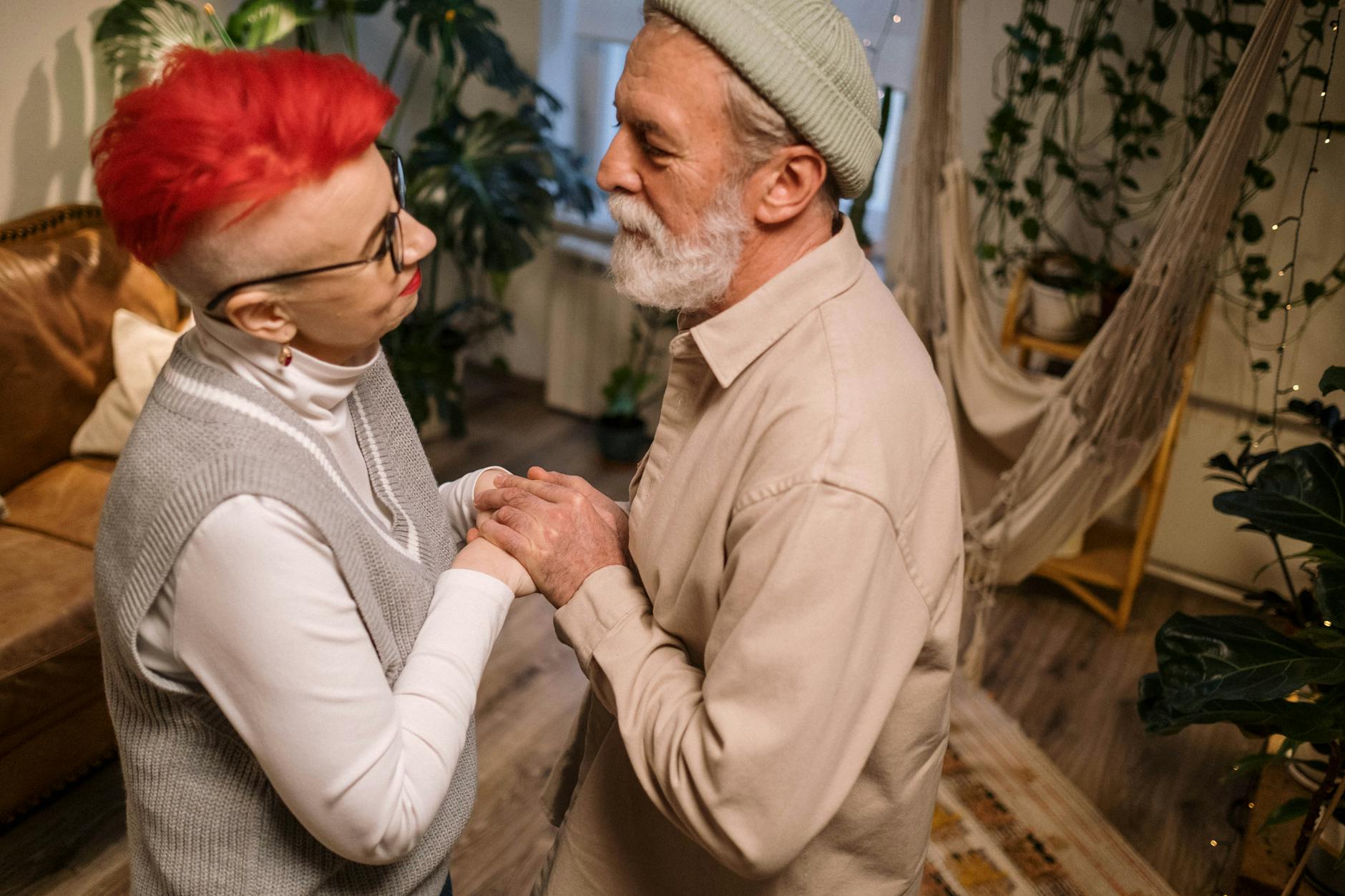 Senior couple reviewing financial documents together planning for extended retirement years