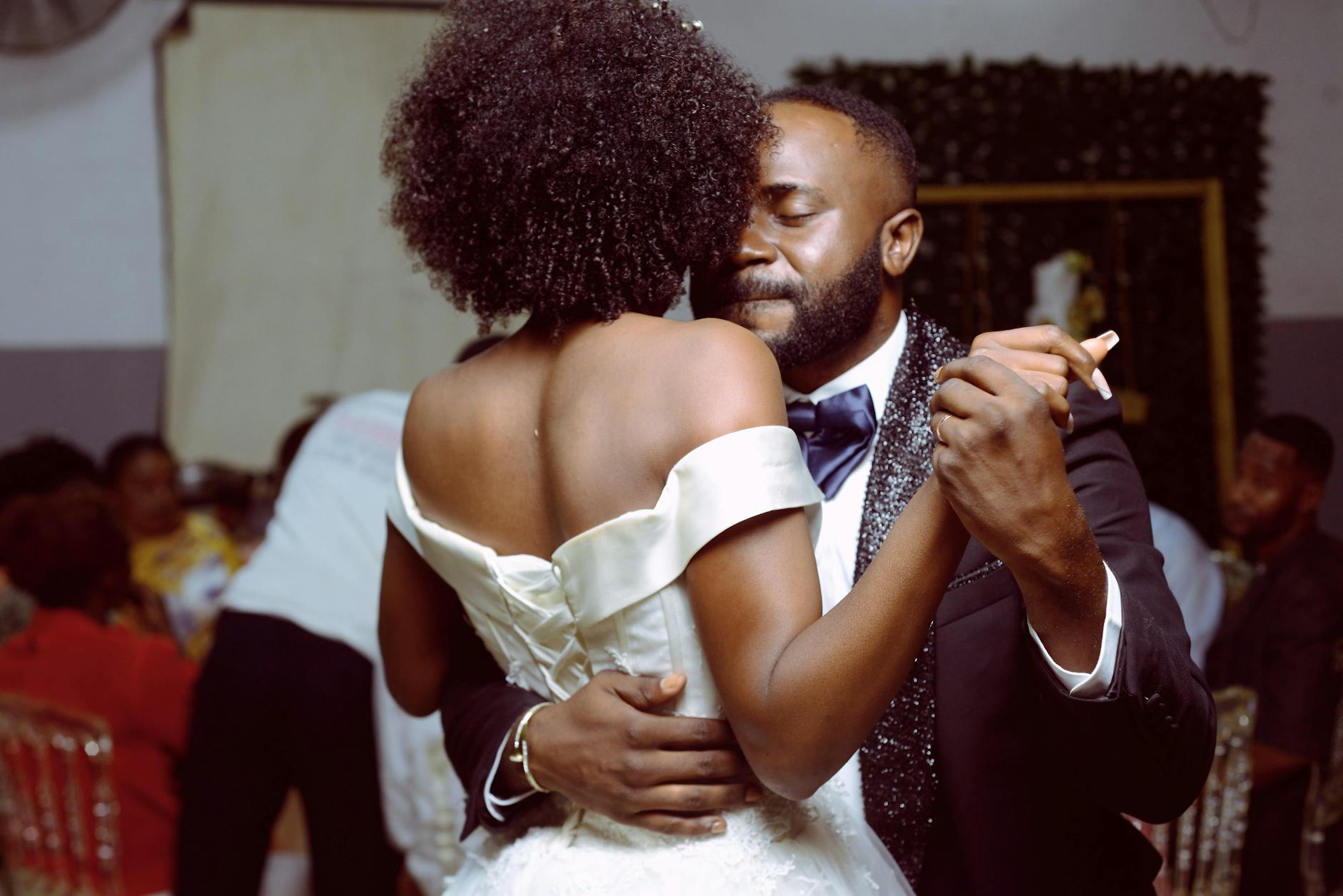 Wedding reception setup with decorated tables and celebration atmosphere