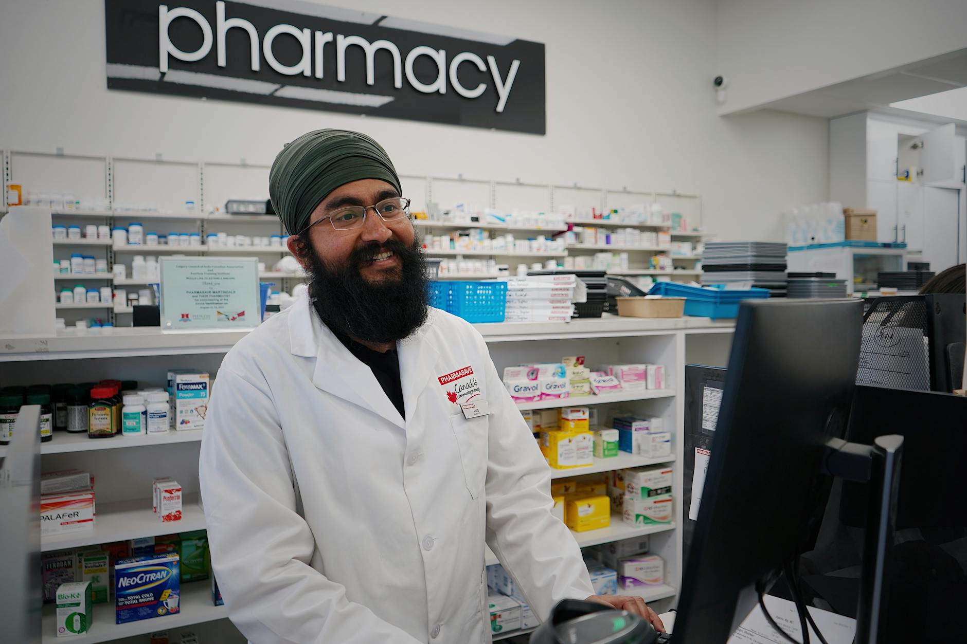 Professional pharmacist preparing customized medication in clean compounding facility