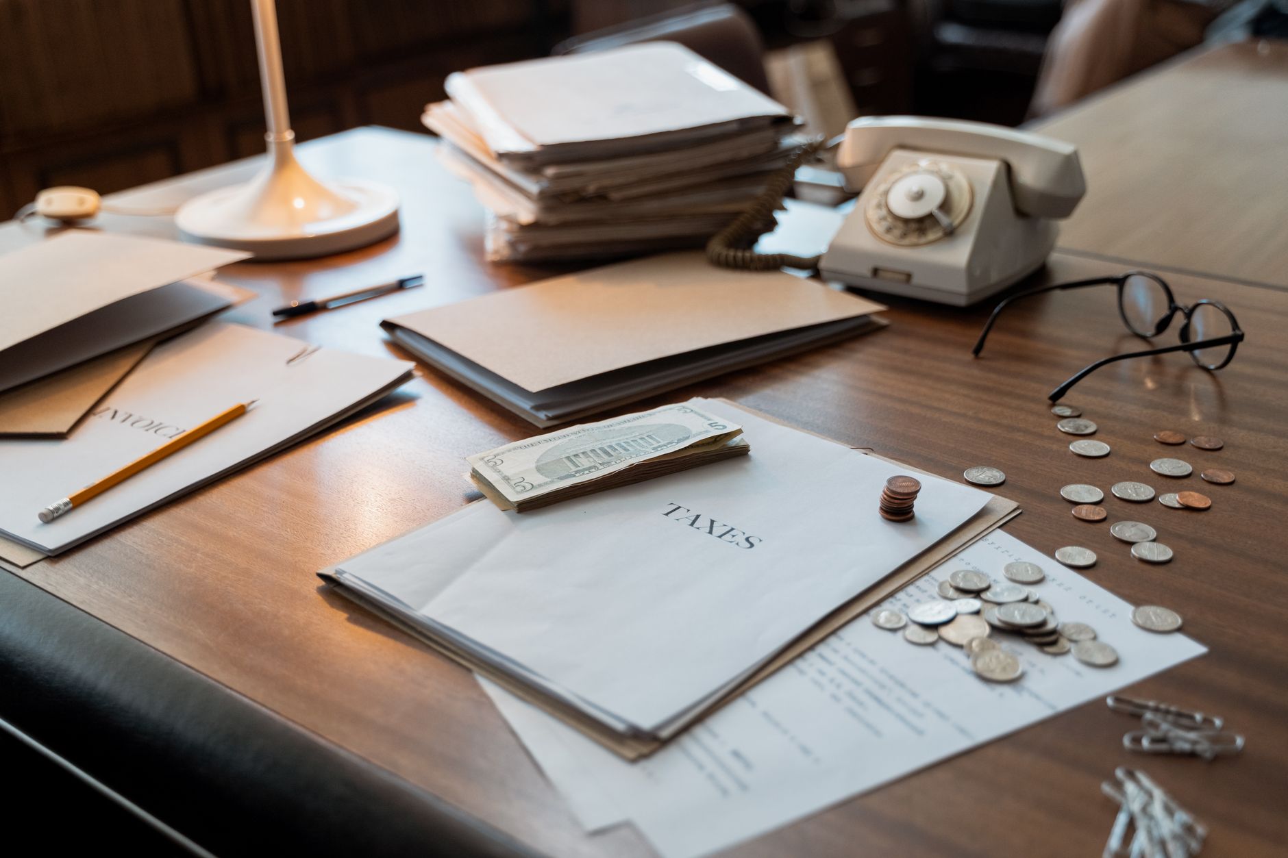 Financial documents and charts on a desk representing structured credit analysis