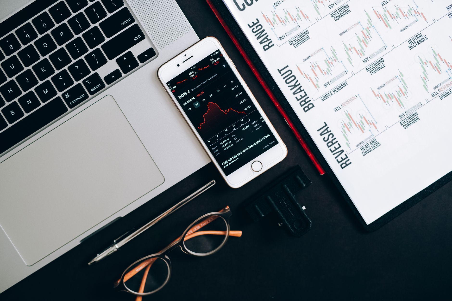 Traders monitoring bond markets on a multi-screen trading desk