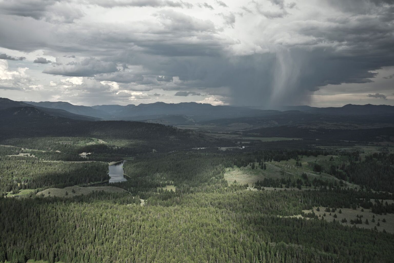 Dark storm clouds viewed from above representing catastrophic weather risk