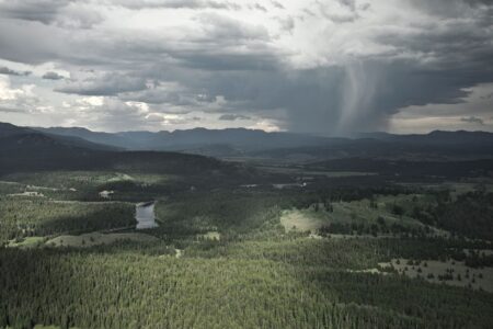 Dark storm clouds viewed from above representing catastrophic weather risk