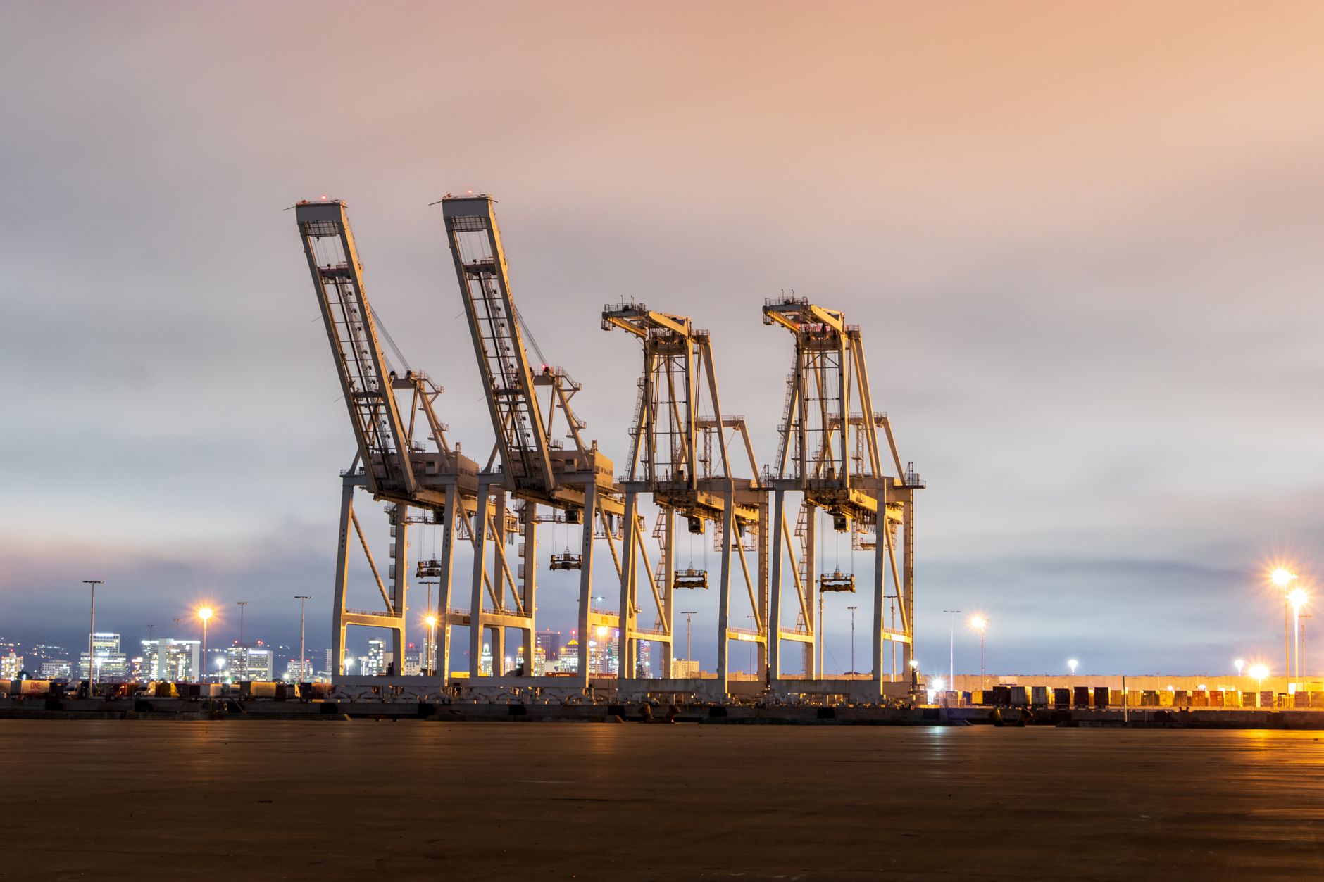 Port cranes and shipping containers representing expanding equipment trust certificate use in infrastructure finance