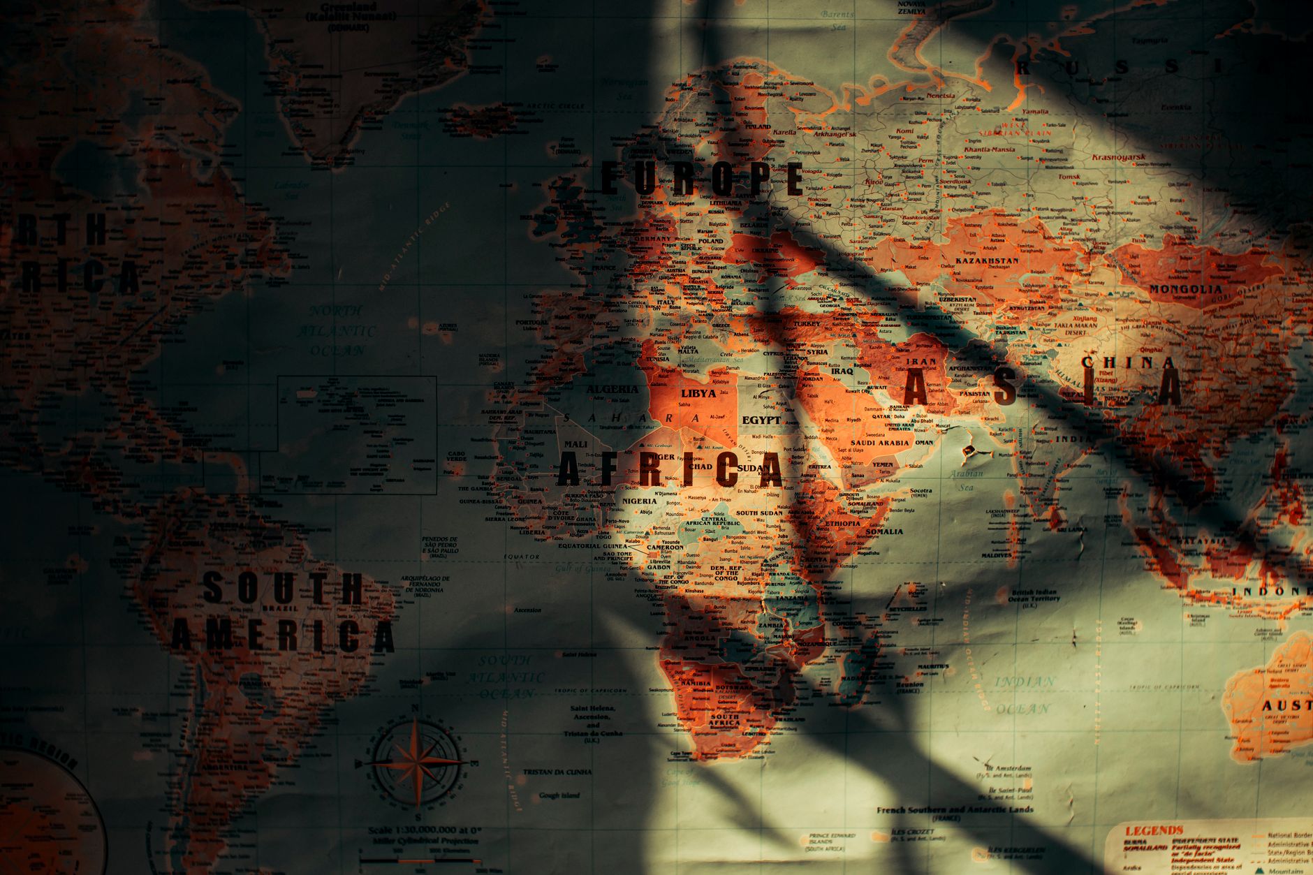 World map overlaid with financial data representing emerging market investment flows
