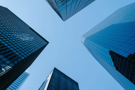 Mortgage REIT Preferred Shares Quietly Attract Rate-Ceiling Bargain Hunters Financial charts and real estate investment documents on a desk