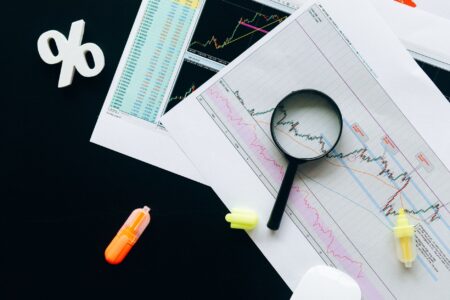 Collateralized Debt Obligations Quietly Resurface Among Structured Credit Hunters Financial analyst reviewing structured credit charts at a desk
