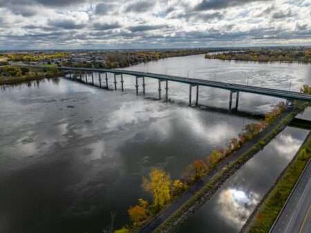 Infrastructure Debt Funds Quietly Absorb Pension Capital as Yields Hold Aerial view of a large infrastructure bridge representing long-duration asset investment