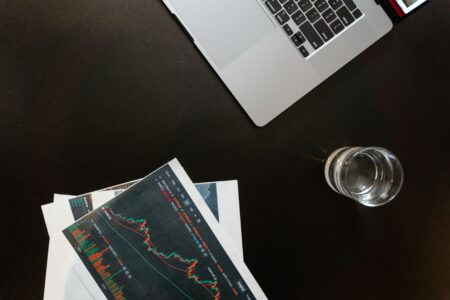 Covered Bond Markets Quietly Regain Footing Among Bank Treasurers Bank treasury trading desk with multiple screens showing bond market data