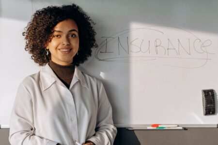 Insurance company office with professionals reviewing fixed income portfolio documents
