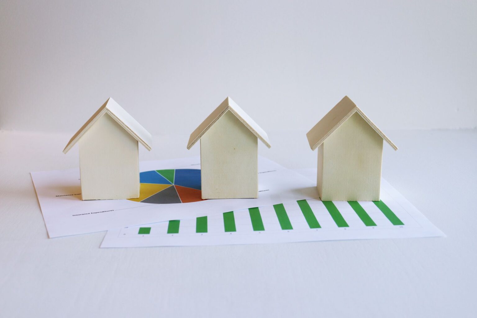 Financial documents and charts representing mortgage-backed securities and real estate investment trust analysis