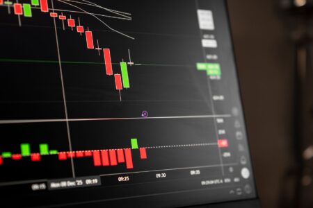 Financial charts and bond market data displayed on a screen